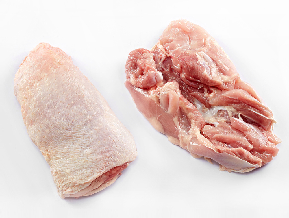 TAVUK-DERİLİ KEMİKSİZ BUT TABAKLI DONUK (KOLİ 12 KG)